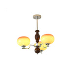 Kingsley Modern Glass Chandelier with Amber Globes for Dining Room and Living Room