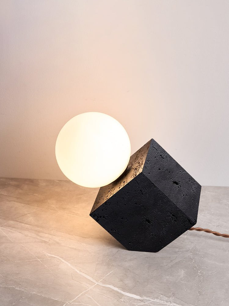 Kryden Sculptural Table Lamp in Black Travertine with Glass Globe