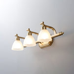 Lana Classic Four-Light Brass Bathroom Wall Sconce in Frosted Glass