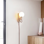 Atlas Globe Wall Sconce in Travertine and Opal Glass