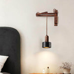 Swing Arm Wall Sconce in Black Travertine and Walnut