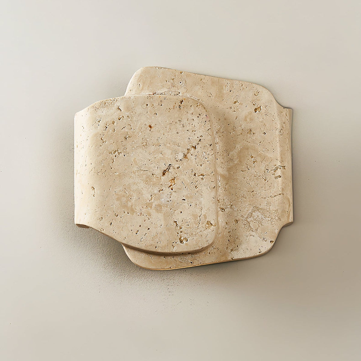 Layered Travertine Wall Sconce with Warm Ambient Glow