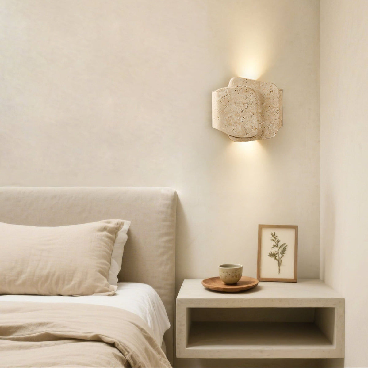 Layered Travertine Wall Sconce with Warm Ambient Glow