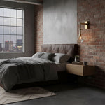Leontine Brass Glass Teardrop Wall Sconce for Modern Interiors