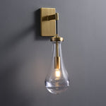 Leontine Brass Glass Teardrop Wall Sconce for Modern Interiors