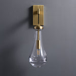 Leontine Brass Glass Teardrop Wall Sconce for Modern Interiors