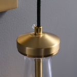 Leontine Brass Glass Teardrop Wall Sconce for Modern Interiors