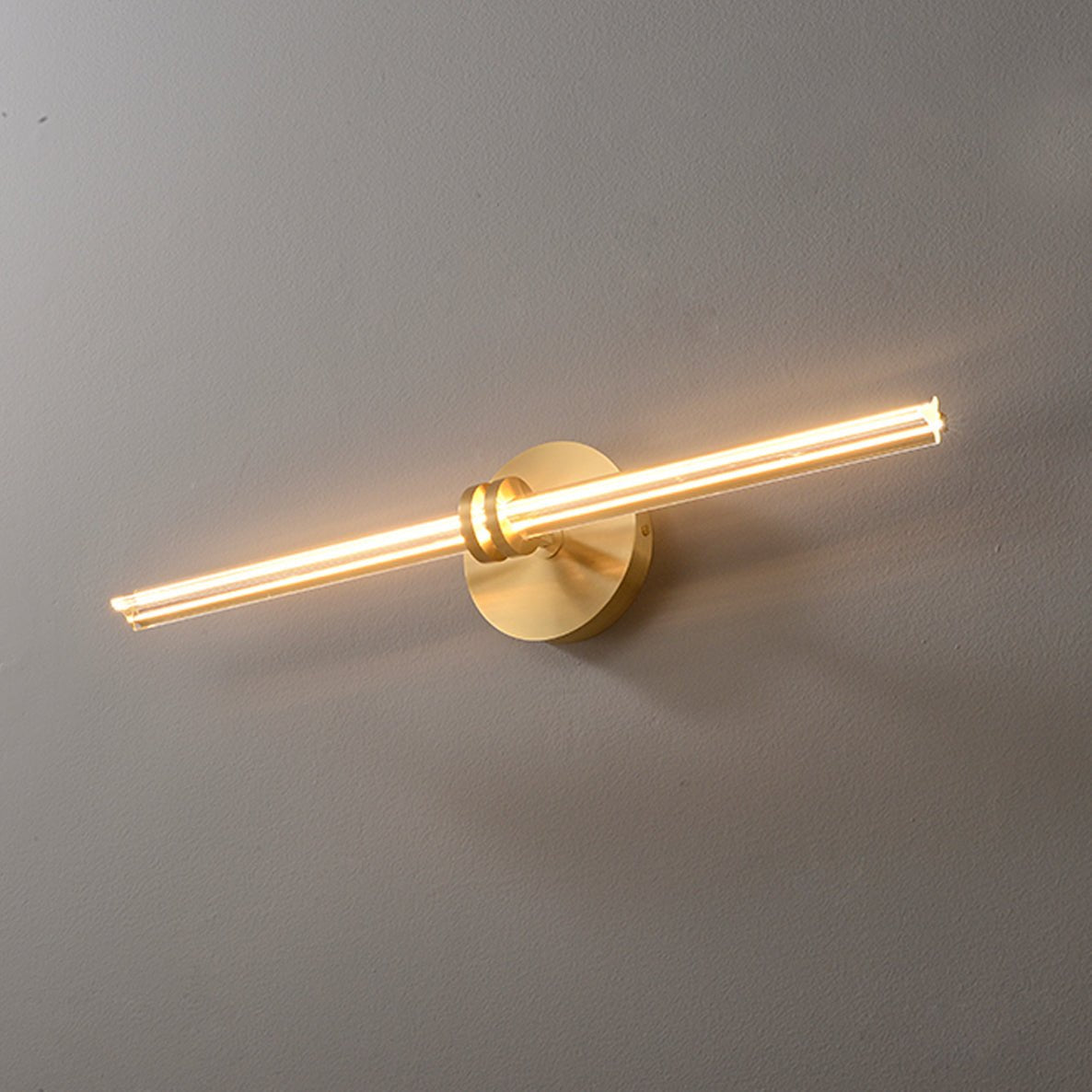 Linear Filament Wall Sconce in Brass and Glass for Modern Interiors