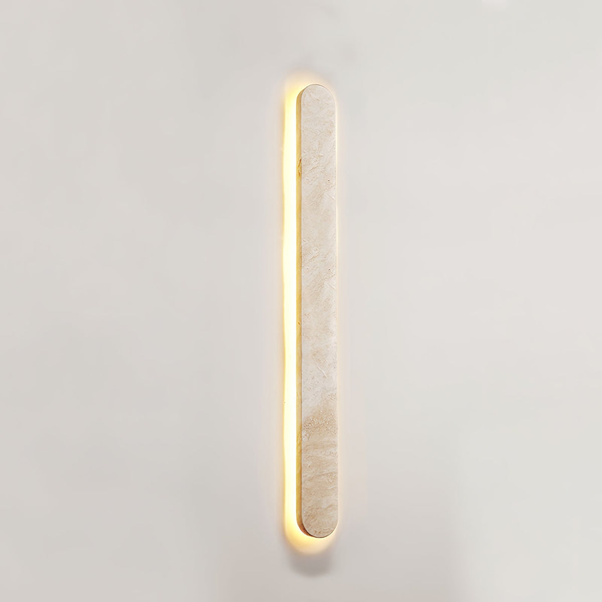 Lior Sculptural Travertine LED Wall Sconce for Modern Interiors