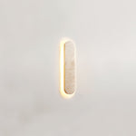 Lior Sculptural Travertine LED Wall Sconce for Modern Interiors