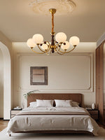 Livia Six-Light Modern Globe Chandelier in Walnut and Gold