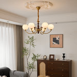 Livia Six-Light Modern Globe Chandelier in Walnut and Gold