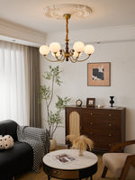 Livia Six-Light Modern Globe Chandelier in Walnut and Gold