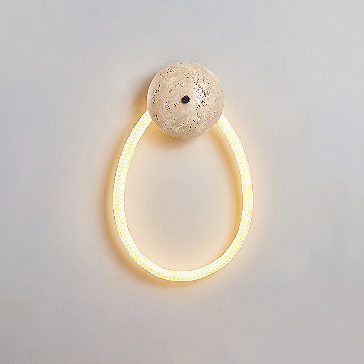 Loop Wall Sconce in Natural Travertine with Braided LED Light