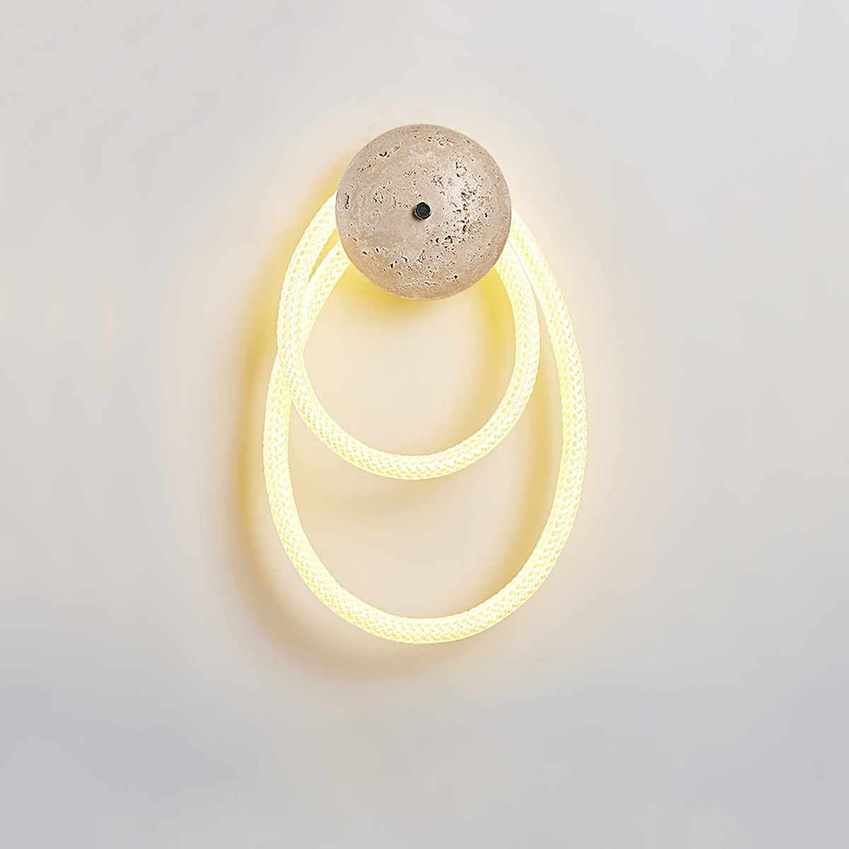 Loop Wall Sconce in Natural Travertine with Braided LED Light