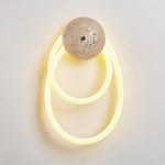 Loop Wall Sconce in Natural Travertine with Braided LED Light