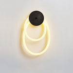 Loop Wall Sconce in Natural Travertine with Braided LED Light