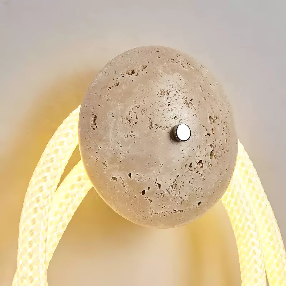 Loop Wall Sconce in Natural Travertine with Braided LED Light