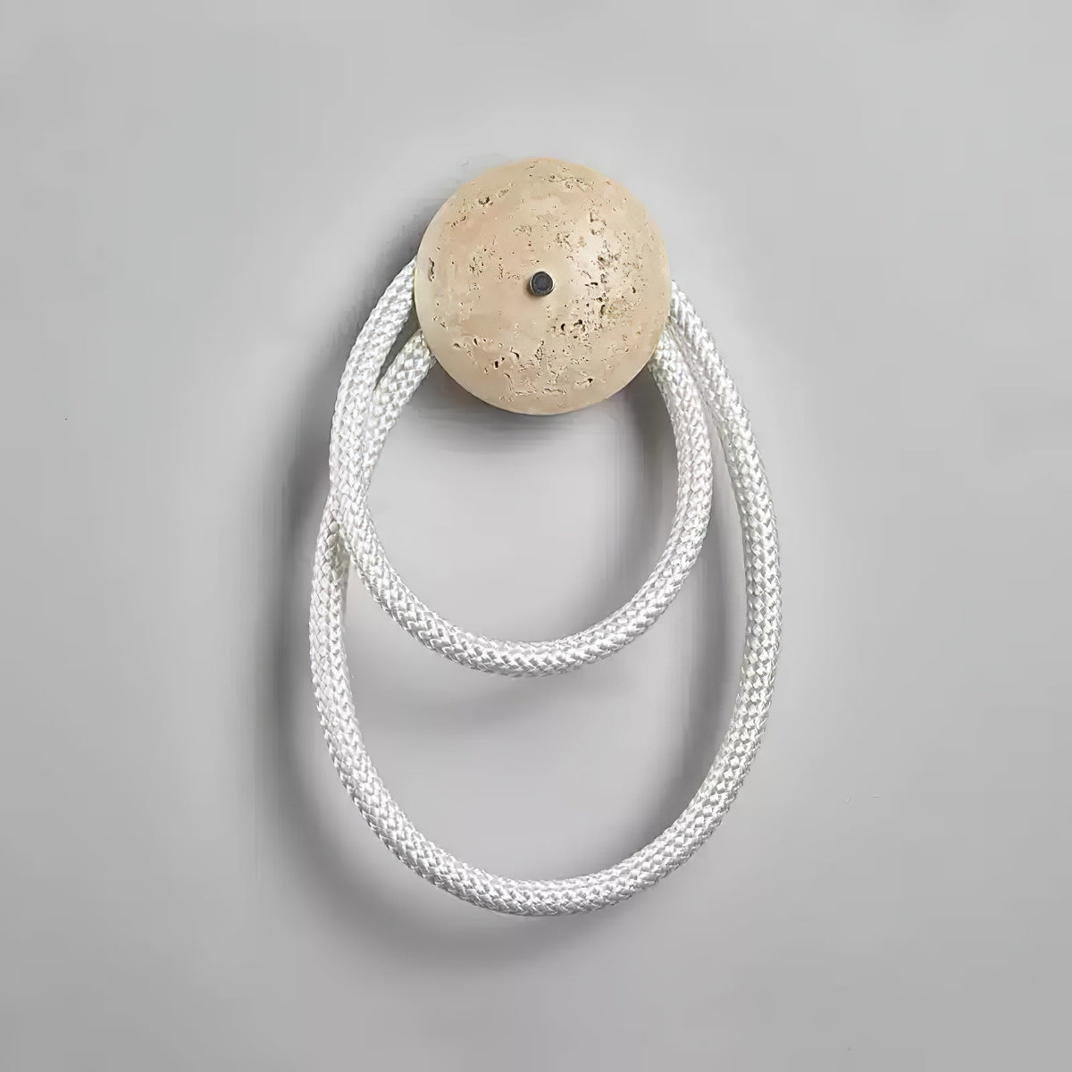 Loop Wall Sconce in Natural Travertine with Braided LED Light