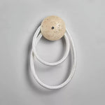 Loop Wall Sconce in Natural Travertine with Braided LED Light