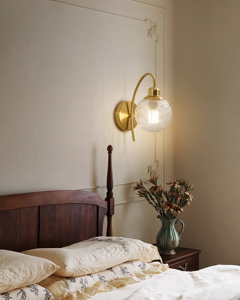 Lucienne Curved Wall Sconce in Gold with Clear Glass Globe