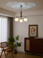 Lucienne Orb Chandelier – Modern Glass & Gold Pendant Light