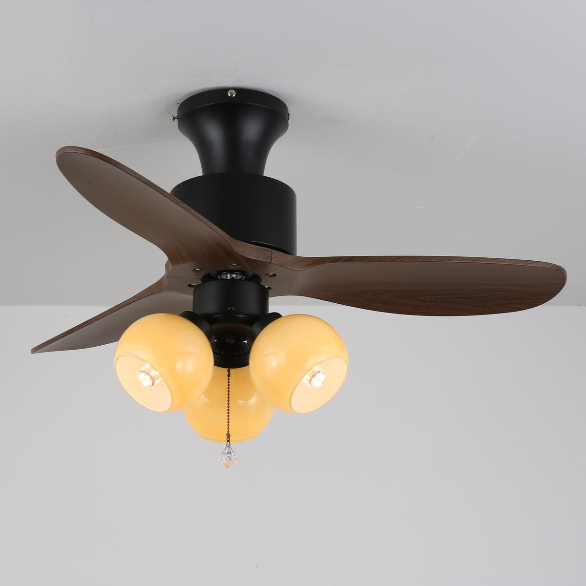 Lumo Orb Ceiling Fan Light with Amber Glass Globes and Walnut Blades