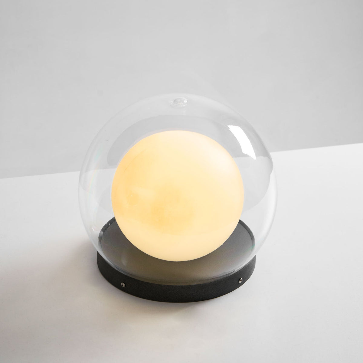 Luna Dome Outdoor Table Lamp – Minimalist Sphere with Protective Glow