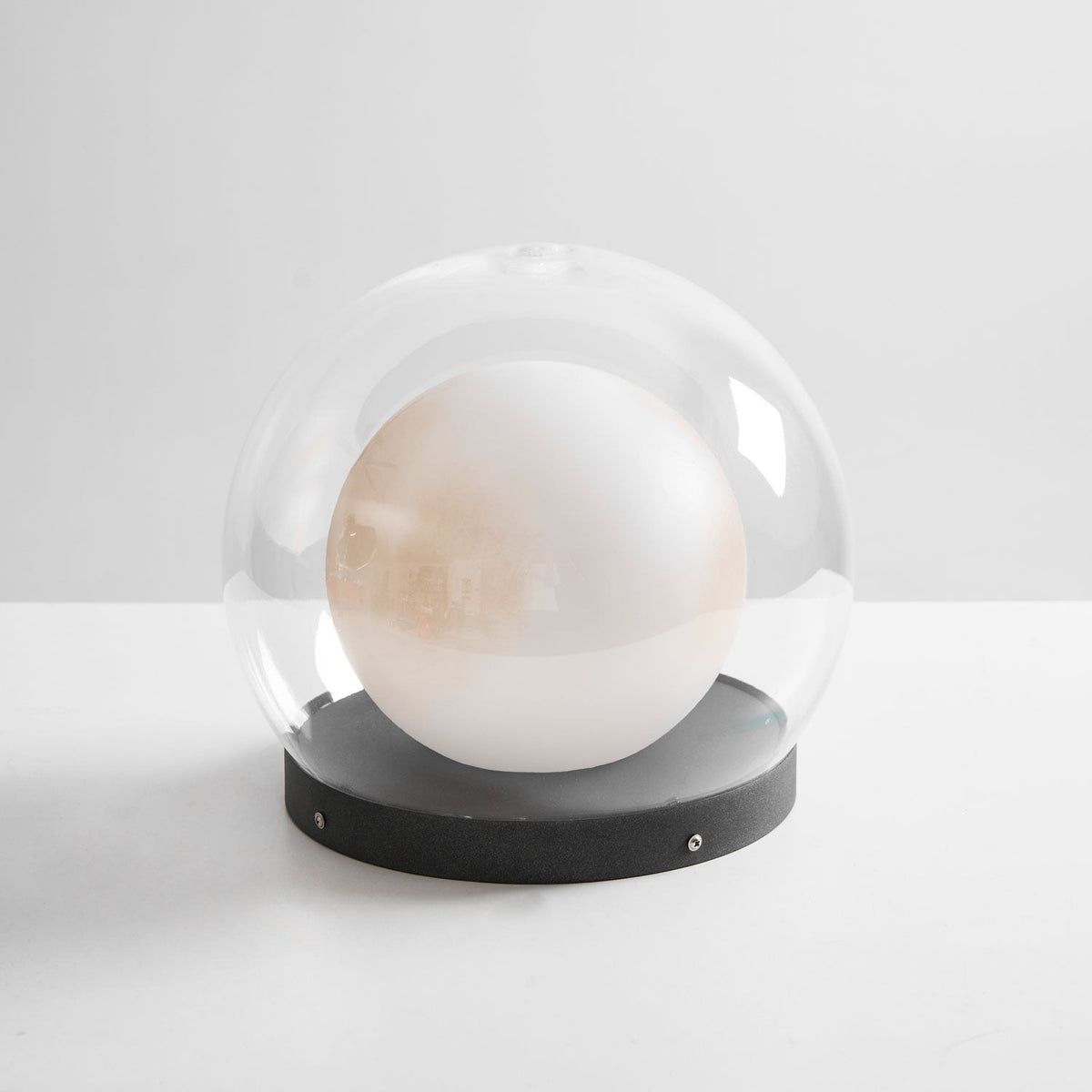 Luna Dome Outdoor Table Lamp – Minimalist Sphere with Protective Glow