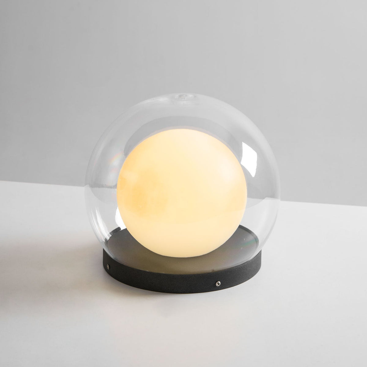 Luna Dome Outdoor Table Lamp – Minimalist Sphere with Protective Glow