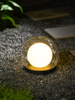 Luna Dome Outdoor Table Lamp – Minimalist Sphere with Protective Glow