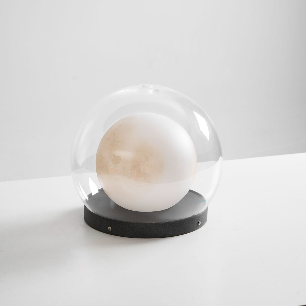 Luna Dome Outdoor Table Lamp – Minimalist Sphere with Protective Glow