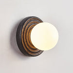 Lunara Black Travertine Wall Sconce with Opal Glass Globe