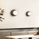 Lunara Black Travertine Wall Sconce with Opal Glass Globe