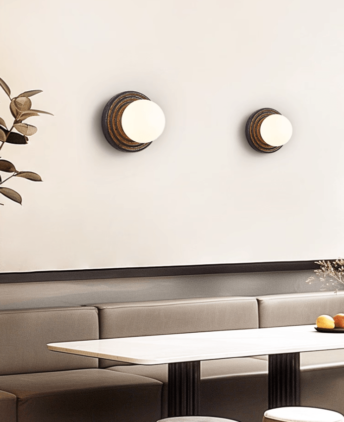 Lunara Black Travertine Wall Sconce with Opal Glass Globe