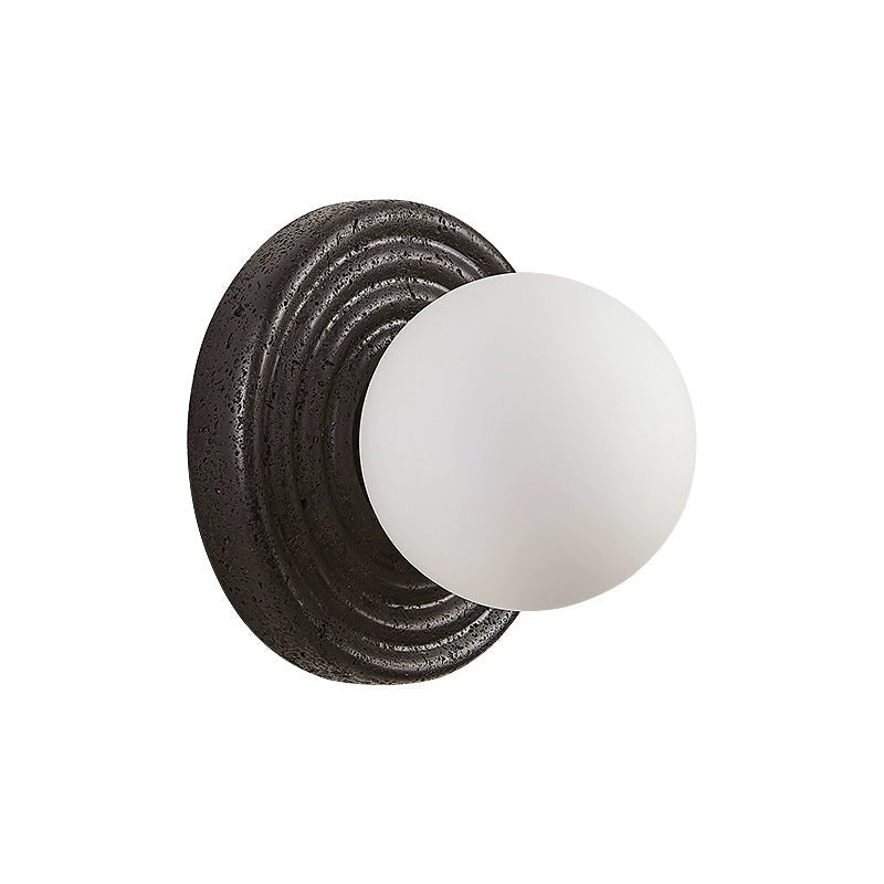 Lunara Black Travertine Wall Sconce with Opal Glass Globe