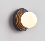 Lunara Black Travertine Wall Sconce with Opal Glass Globe
