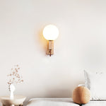 Lunar Travertine Wall Sconce with Opal Glass Globe