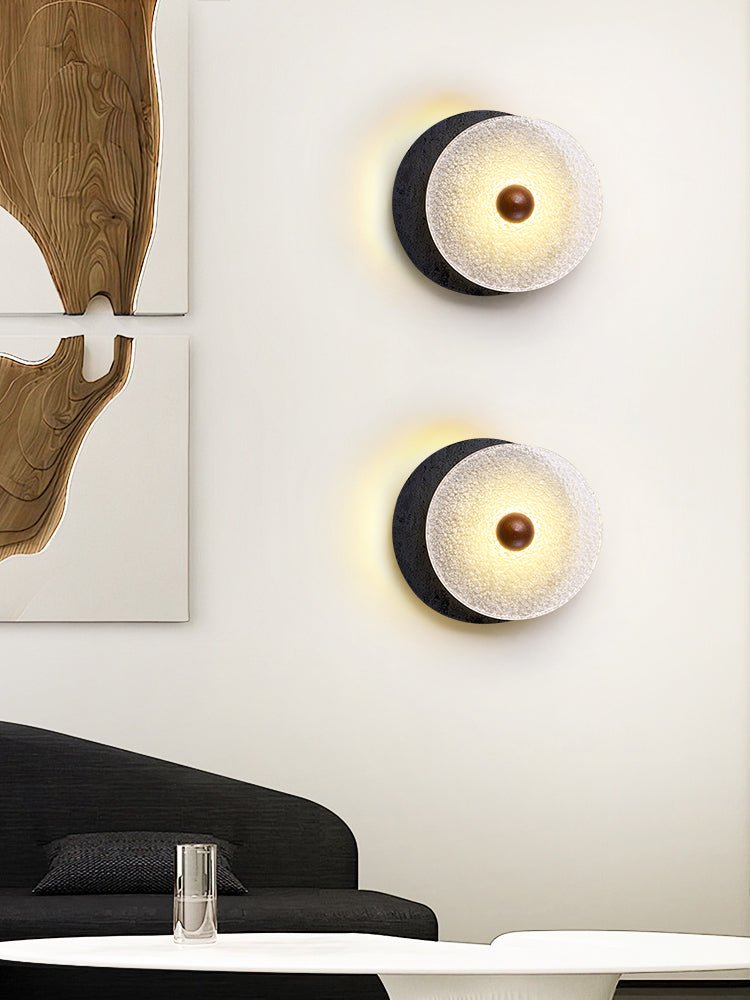 Lunara Textured Disc Wall Sconce in Black Travertine and Frosted Glass