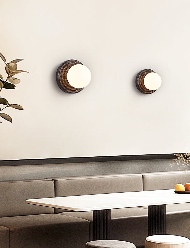 Lunara Black Travertine Wall Sconce with Opal Glass Globe