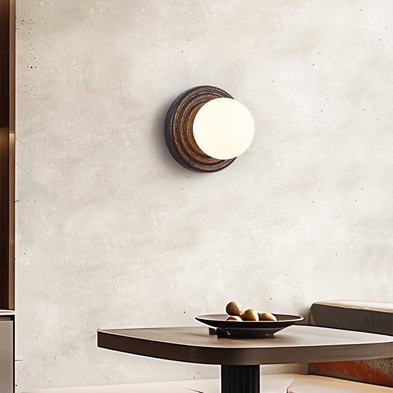 Lunara Black Travertine Wall Sconce with Opal Glass Globe