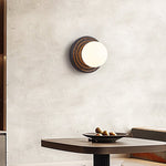 Lunara Black Travertine Wall Sconce with Opal Glass Globe