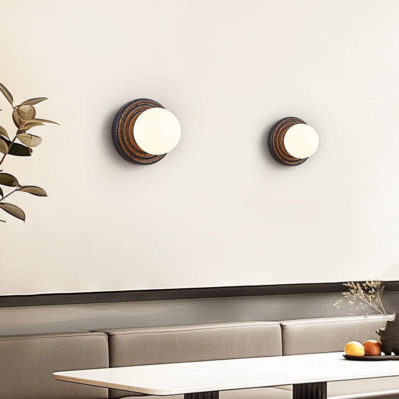 Lunara Black Travertine Wall Sconce with Opal Glass Globe