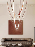 Lunestra Strap Chandelier — Sculptural LED Pendant Light in Leather and Brass