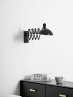 Maxon Adjustable Spring Wall Sconce in Glossy Black
