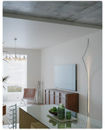 Sculptural Ribbon LED Wall Sconce in Silver – Modern Minimalist Lighting