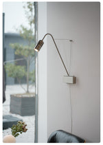 Adjustable Wall Sconce with Integrated LED for Reading and Ambient Light