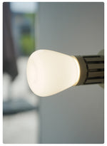 Adjustable Wall Sconce with Integrated LED for Reading and Ambient Light