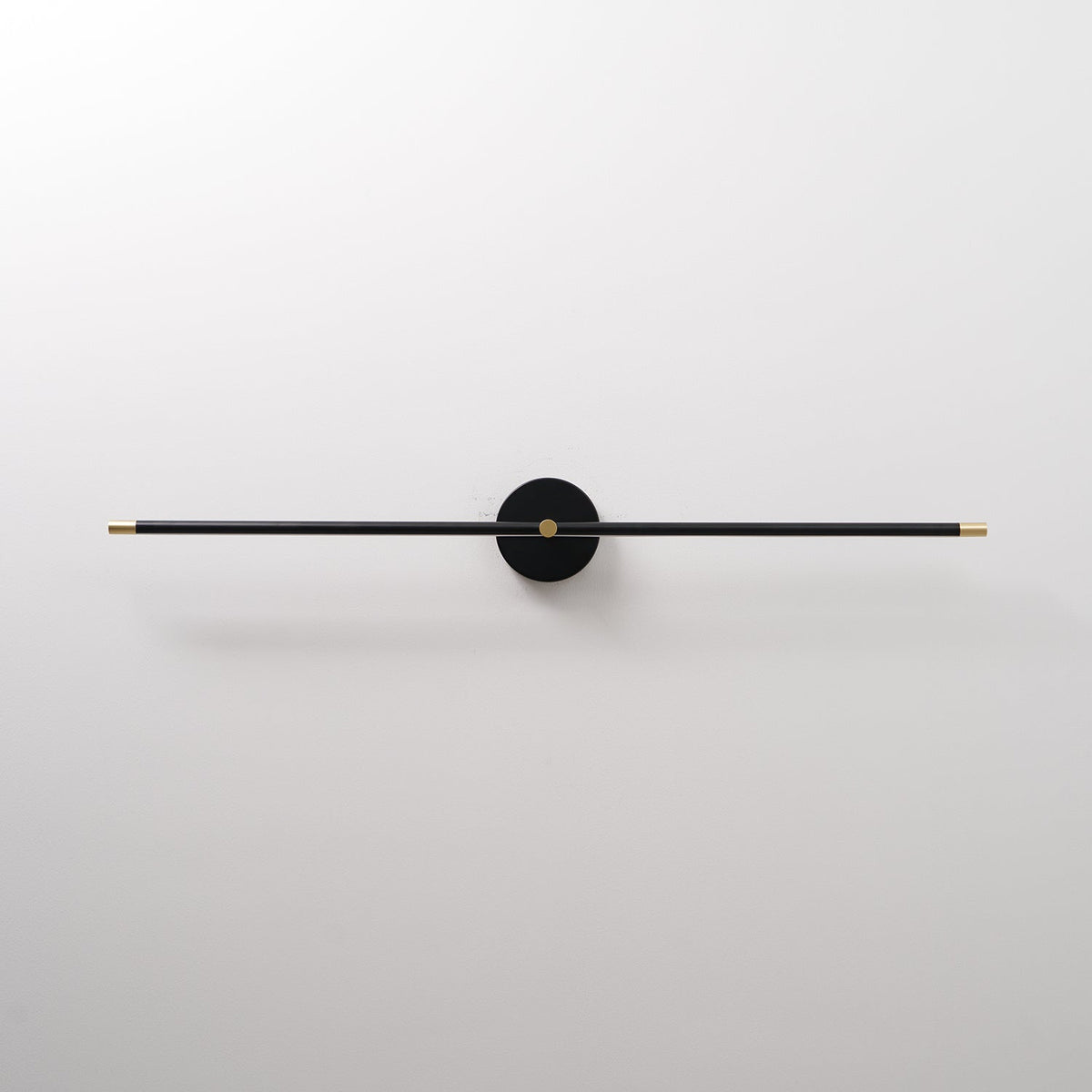 Linear LED Plug-In Wall Sconce with Metal Body and Warm Glow