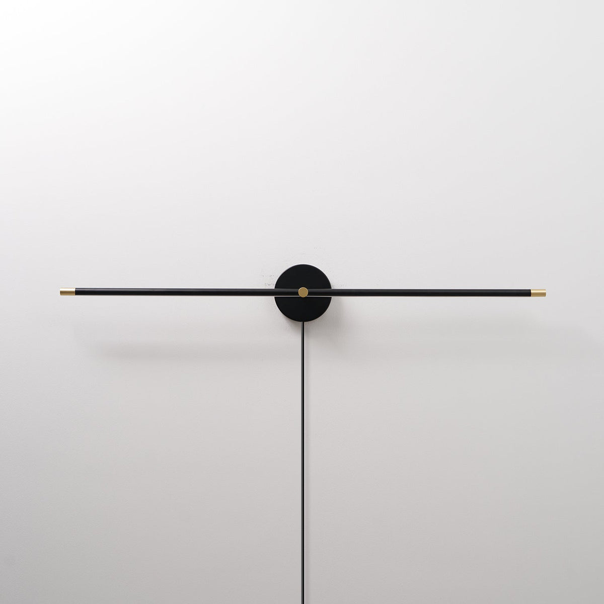 Linear LED Plug-In Wall Sconce with Metal Body and Warm Glow